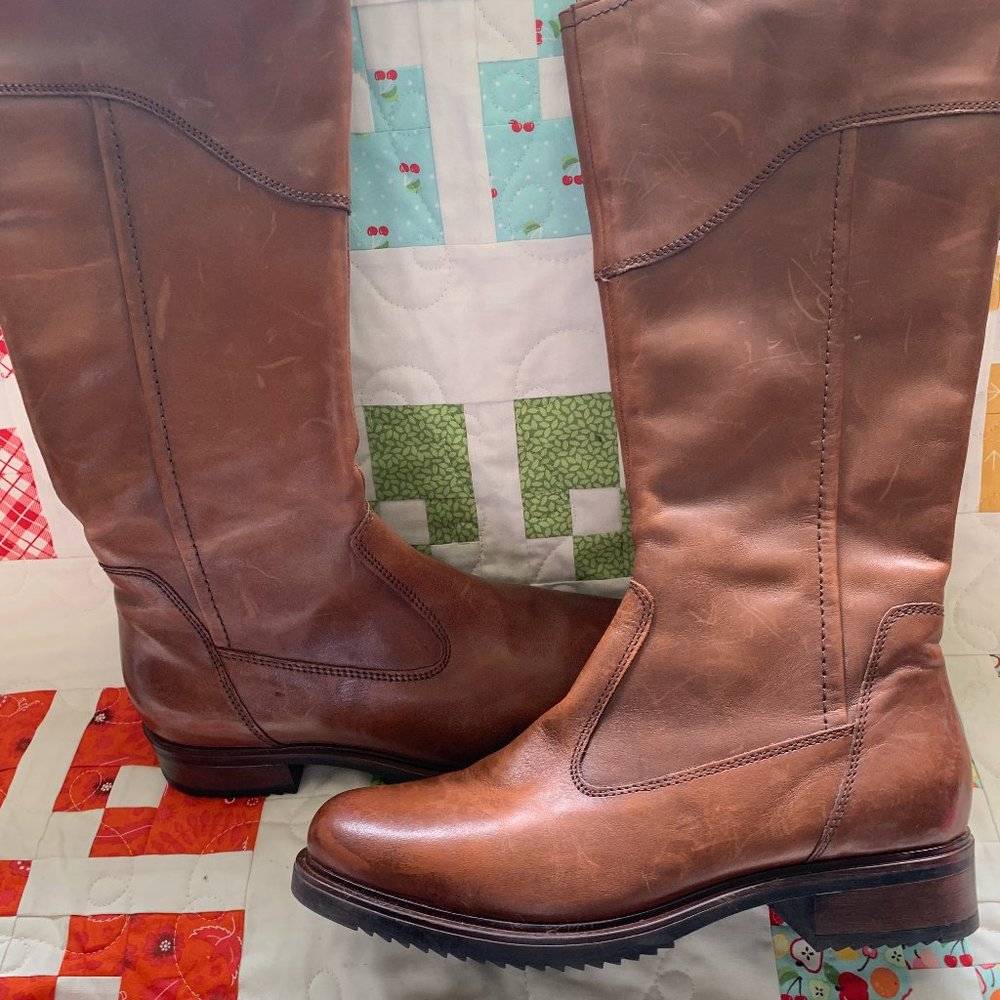 Beautiful and so cozy.  Brown Leather Boot with Side Zip.